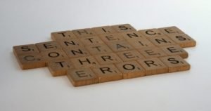 Scrabble tiles on a white table