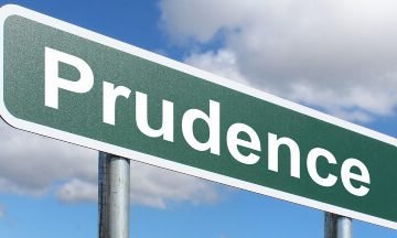 Prudence street sign representing a thoughtful retirement plan decision-making process